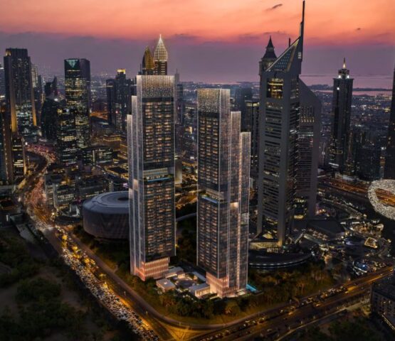 Emirates Towers by Meraas – High-rise towers at dusk with pool view