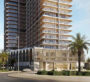 Modern high-rise residential tower of Binghatti Starlight in Dubai with palm trees