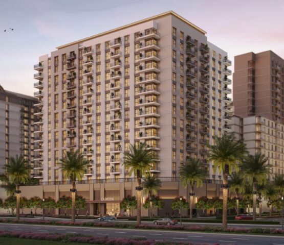 Modern high-rise towers of Camden project in Dubai at sunset