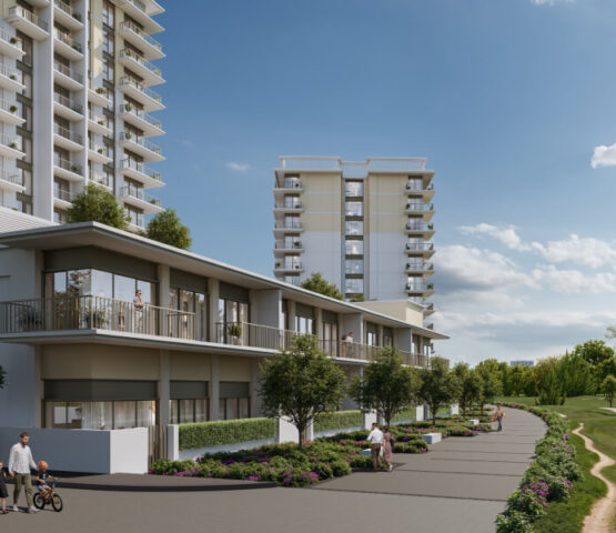 A sleek, modern residential tower surrounded by lush green golf courses, offering a premium lifestyle with breathtaking views and resort-style living.
