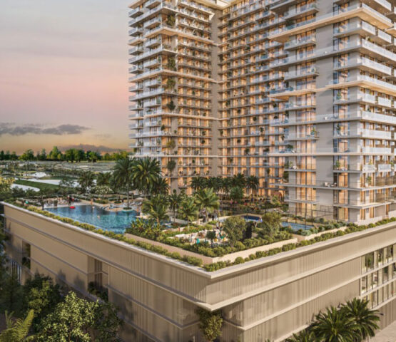 A striking image of Sol Levante’s luxury high-rise tower, standing tall amidst landscaped gardens and a stylish pool area in Jumeirah Village Triangle (JVT).