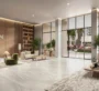 Bright, modern lobby at Alton by Nshama in Dubai with cozy seating and a fresh look.