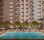 Outdoor pool with sun loungers at Camden project in Dubai