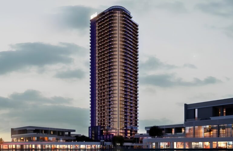 Night view of MBL Signature residential tower in Dubai with modern architectural design