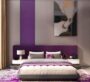 Stylish bedroom with purple accents and modern furniture at MBL Signature Dubai