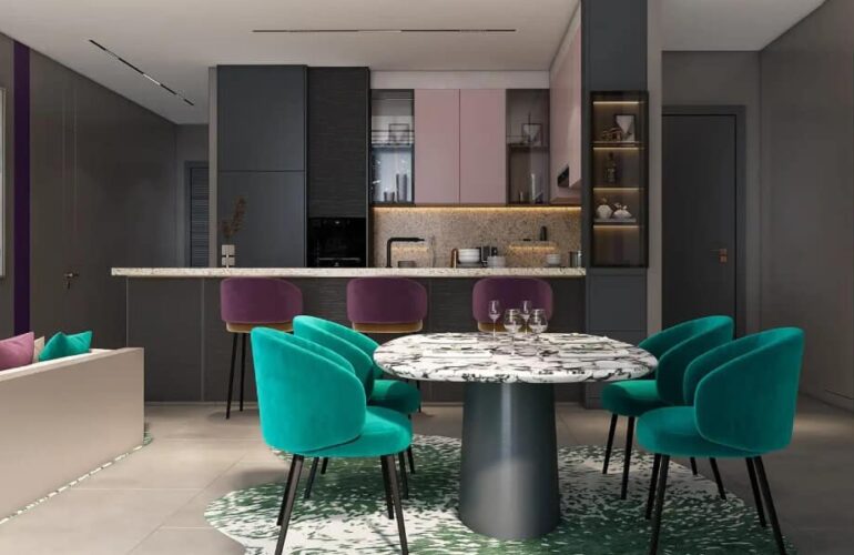 Contemporary dining area with teal chairs and modern kitchen at MBL Signature Dubai