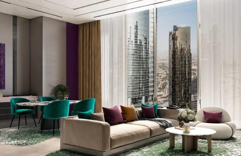Spacious living room at MBL Signature Dubai with skyline view and modern décor