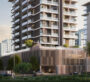 Street-level view of the main entrance at Gate Royale Residences with landscaped surroundings