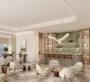 Marriott-Residences-at-JLT- A modern lounge with neutral-toned furniture, a sleek bar area, and minimalist decor, creating a calm and contemporary atmosphere