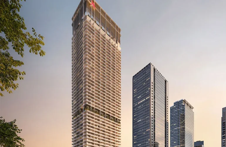 Marriott-Residences-at-JLT- front view High-rise apartments with facades in navy and silver colors, featuring mesh window screens