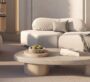 Elegant minimalist living room interior with cream tones and soft modern furniture.