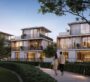 Modern luxury villas at Selvara at dusk, with warm lighting and landscaped pathways.