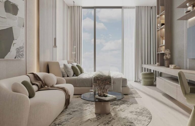Cozy living space with neutral tones and large window at Cove Boulevard