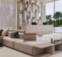Minimalist lounge area with modern design and large glass windows at Nuvana Dubai.