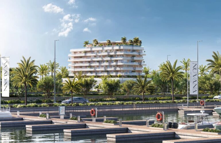 Waterfront view of Nuvana building with modern architecture in Dubai