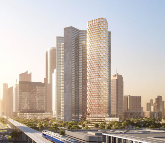 A modern high-rise tower set against a bustling city skyline, bathed in warm golden sunlight, offering urban luxury living.