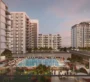 Inviting pool and lounge space at Alton by Nshama, Dubai, surrounded by greenery and homes.