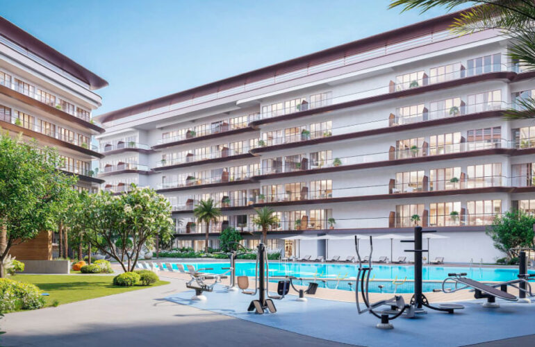 Modern residential buildings surrounding a vibrant pool area