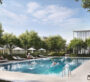 Resort-style pool and sun deck at Vida Residences Hillside Dubai