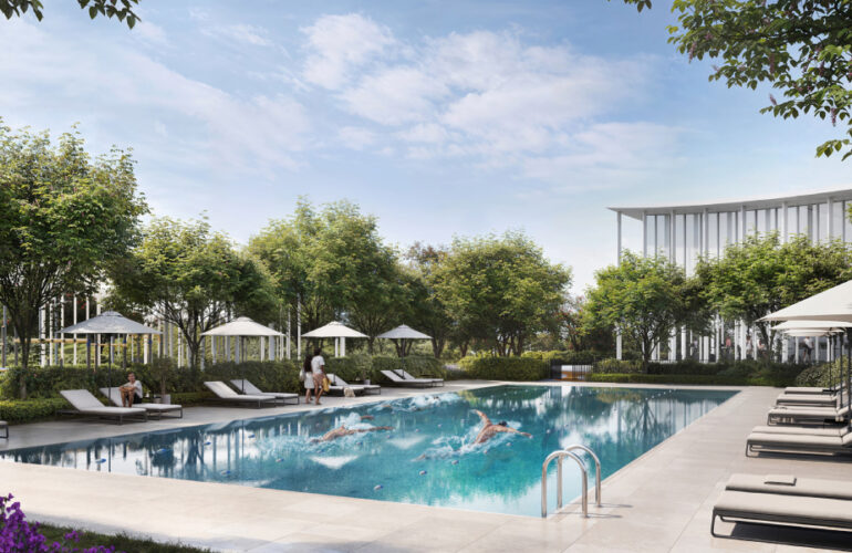 Resort-style pool and sun deck at Vida Residences Hillside Dubai