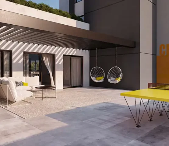 A stylish outdoor terrace with modern furniture and a tranquil ambiance at Reeman Living Phase 2, Dubai.