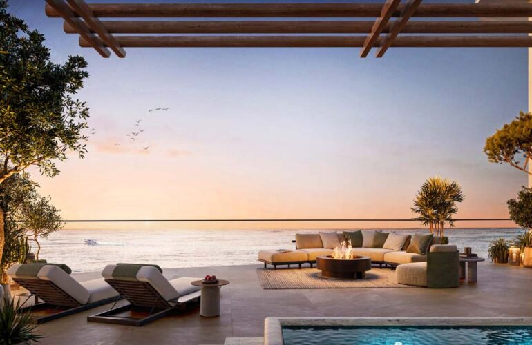 Sunset lounge pool deck with oceanfront at The Mural by Beyond in Dubai