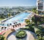Beautiful outdoor pool surrounded by greenery at Binghatti Circle in Dubai
