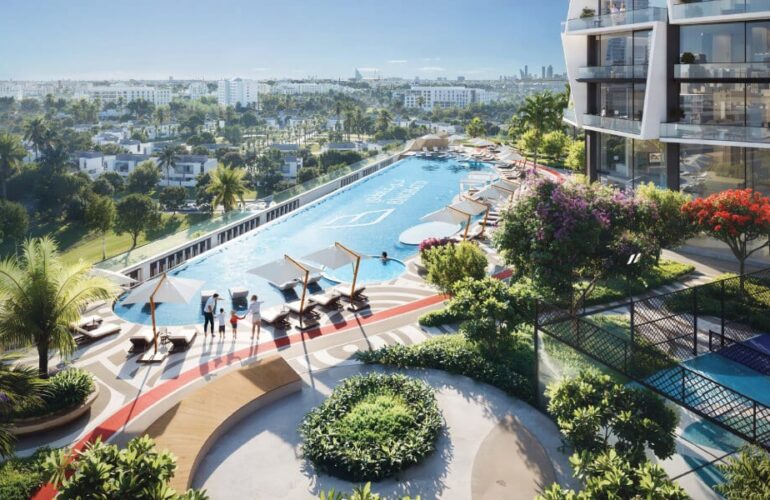 Beautiful outdoor pool surrounded by greenery at Binghatti Circle in Dubai