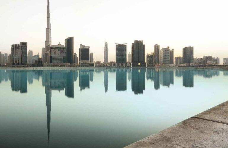 The Atria Riverside-View The Business Bay river, with apartments and the Burj Khalifa visible on the other side of the river.