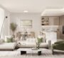 Bright living room with neutral tones, modern furniture, and large windows in Riverton House.