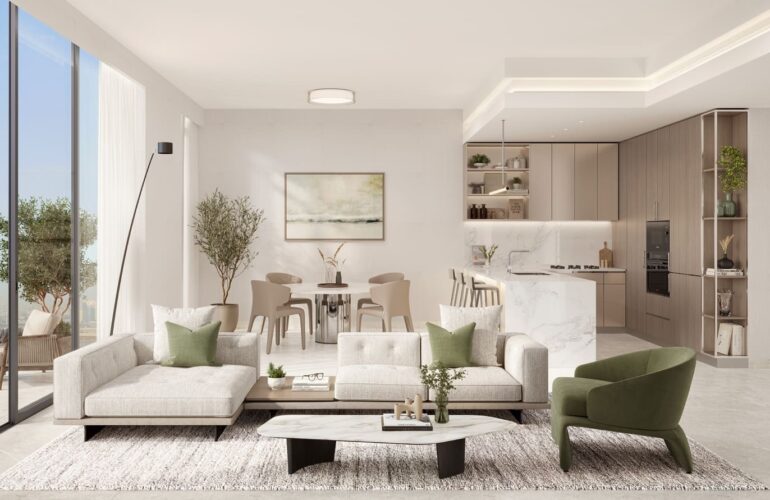 Bright living room with neutral tones, modern furniture, and large windows in Riverton House.