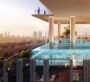 Infinity pool on the rooftop overlooking the city at sunset at Cove Boulevard
