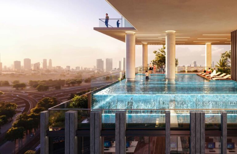 Infinity pool on the rooftop overlooking the city at sunset at Cove Boulevard