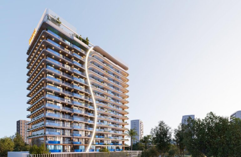 An apartment at SAMANA Park Meadows in Dubai, surrounded by trees and green spaces with a blue sky above