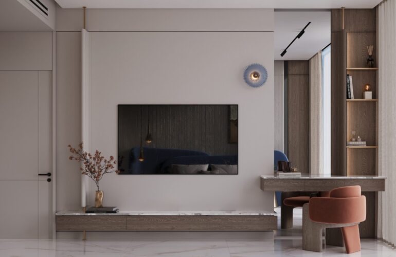 Minimalist living room with built-in TV wall and warm lighting at SAMANA Sky Views.