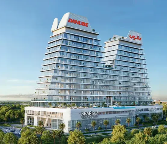 Iconic curved towers of Sparklz by Danube Dubai with sleek glass façade and signature branding.