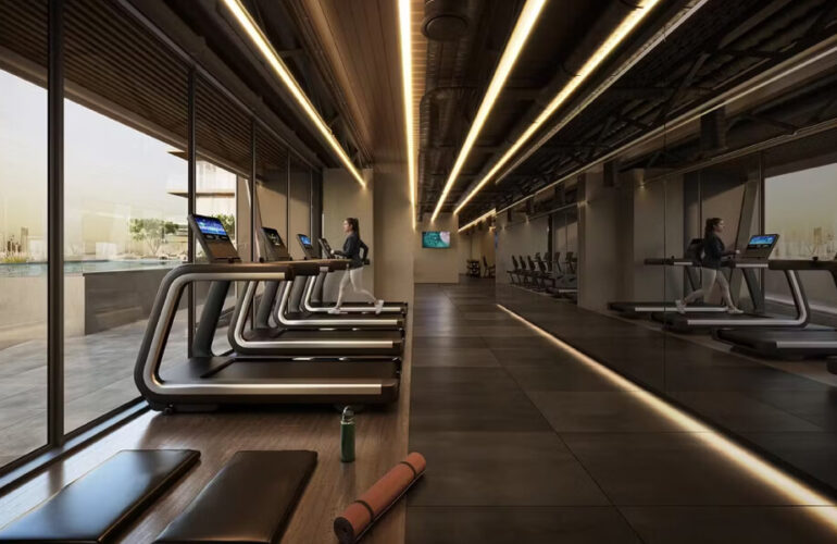 Modern fitness center with advanced equipment at Binghatti Starlight Dubai