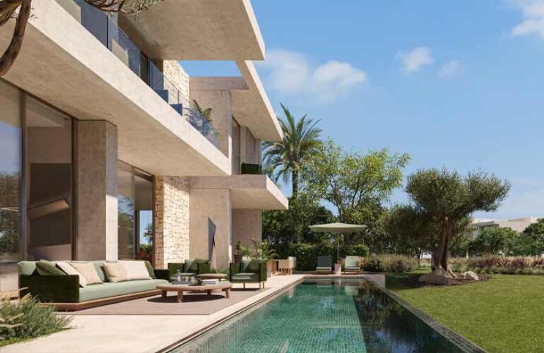 A photo taken from the side angle of a villa at The Acres Estates in Dubailand, showcasing the villa's yard. The yard features a large pool, surrounded by lush green spaces.