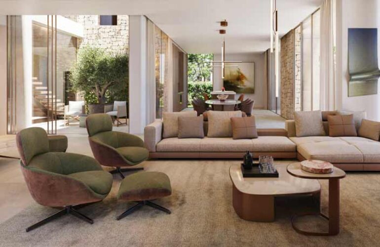 Guest room at The Acres Estates in Dubailand with sofas arranged together, a table, and a set of bathtubs, with the interior of the house clearly visible.