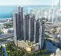 Aerial view of The Eden towers with Dubai skyline and coastline in the background