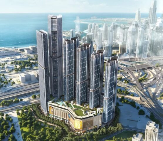 Aerial view of The Horizon towers with Dubai skyline and coastline in the background
