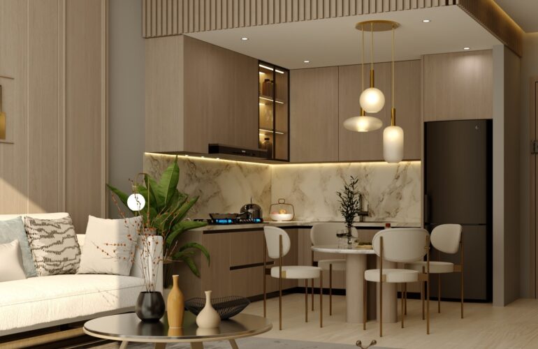 A kitchen at Trinity - Kitchen in Dubai, part of Dubai’s luxury real estate, featuring a white sofa at the entrance and a chandelier in the space.