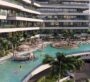 An infinity pool at Trinity Podium-Pool in Dubai, located on a balcony-like area above the apartment. Palm trees surround the pool, and people are swimming in it. Part of Dubai's luxury real estate