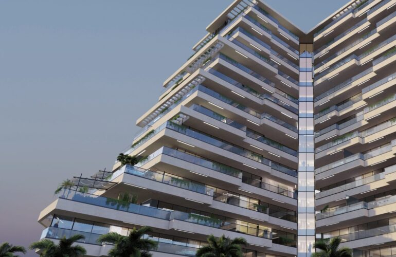 A two-section apartment at Trinity Exterior-Lift Lobby in Dubai, featuring a modern design and a clear blue sky in the background. Part of Dubai's luxury real estate