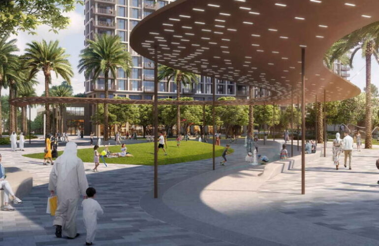 Lush green community park and shaded walkways at Valia by Emaar Properties